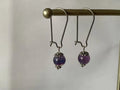 Orecchini pendenti in acciaio platino con fluorite viola naturale 8mm